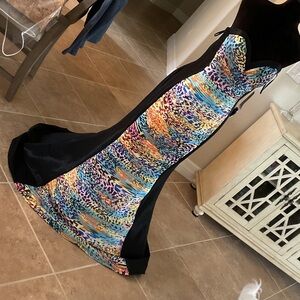 JOVANI Showstopper….back zip, multicolor front with black back, size 8, NWT
